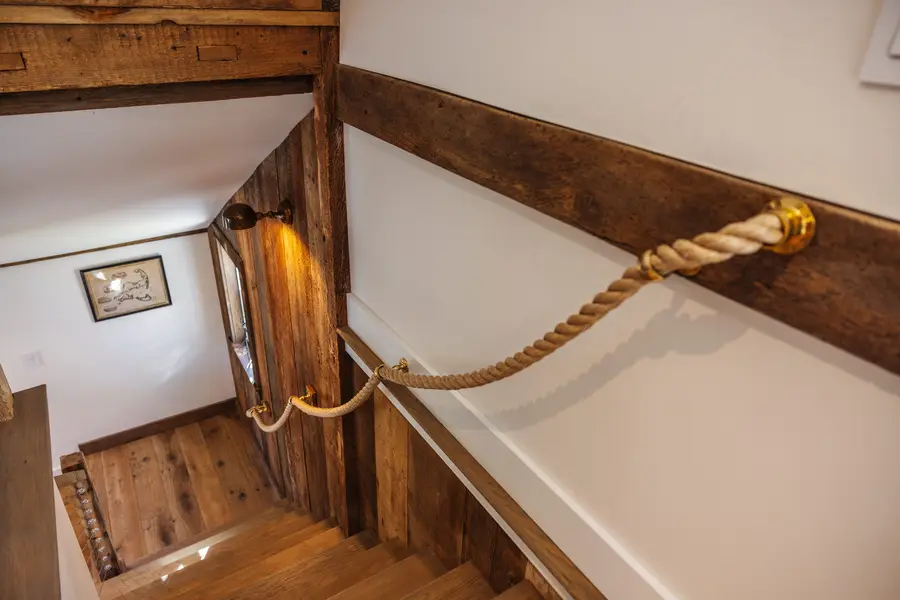 Rope handrail on the barn staircase
