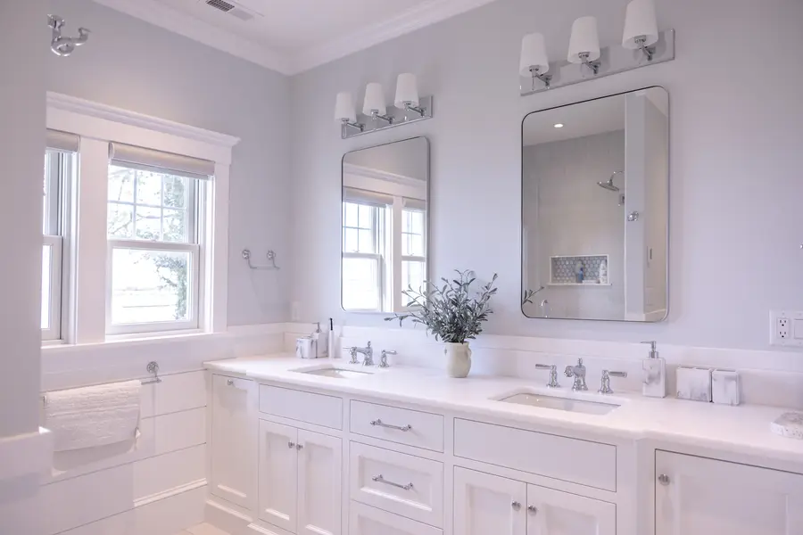 Double vanity bathroom with shiplap and harbor-view windows