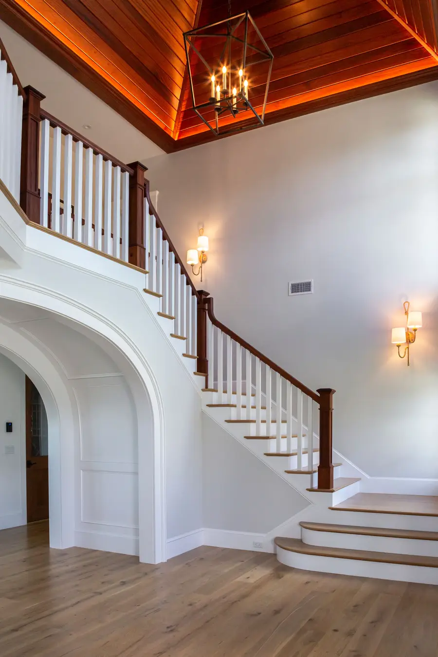 Stair hall under the mahogany vaulted ceiling and lantern