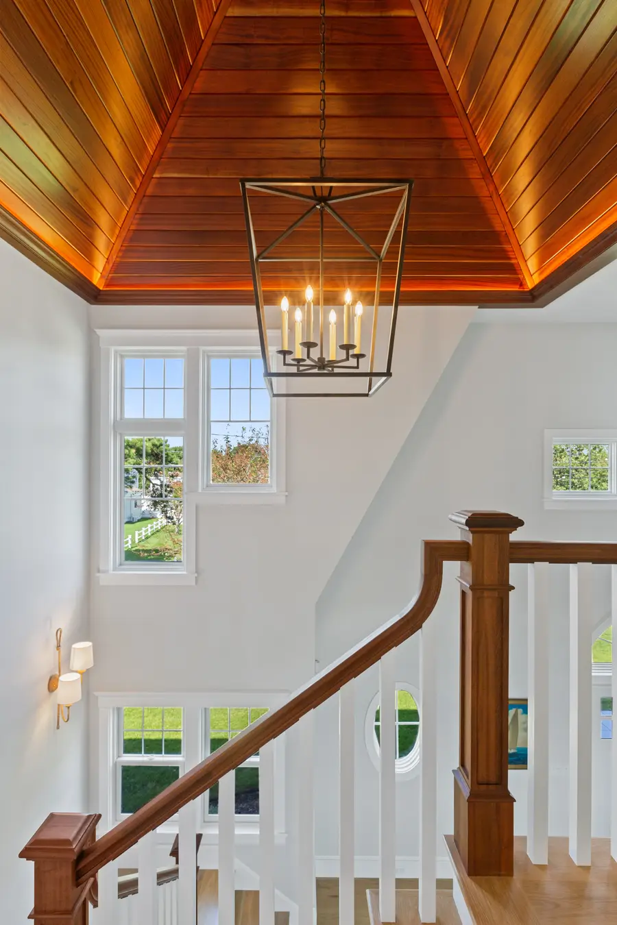 Looking down the stairwell from under the mahogany ceiling