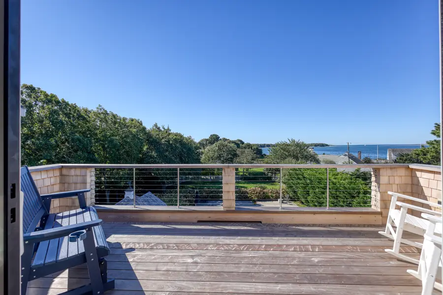 Deck with a cable rail looking out to the water