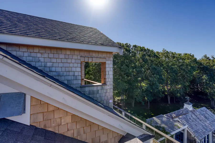 Cedar-shingled dormer over the deck