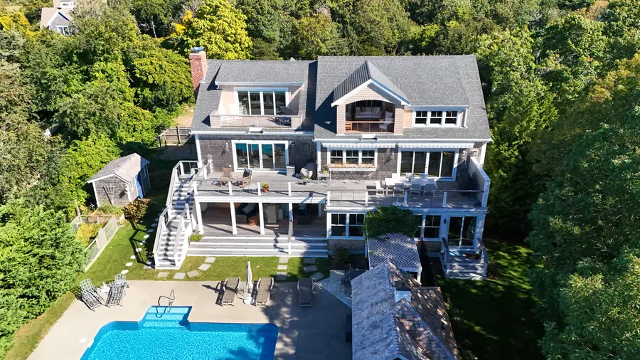 Rear of the house with decks over the pool