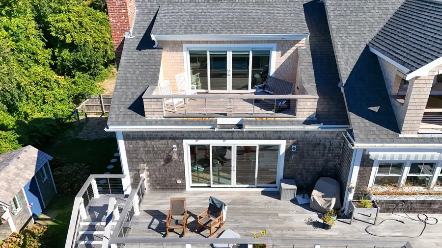 Upper deck and sliders under the dormers