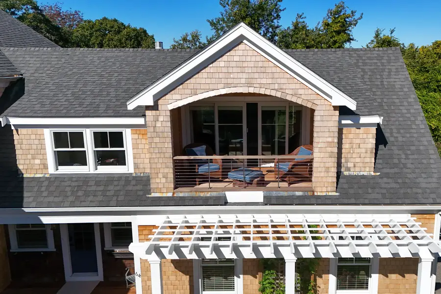 Center dormer above the pergola entry