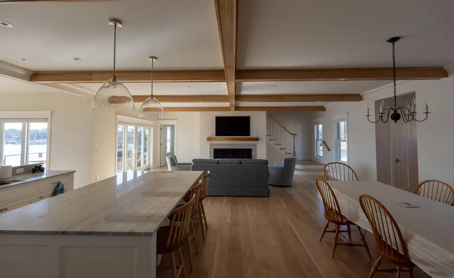 Kitchen island looking across the dining and living areas to the river