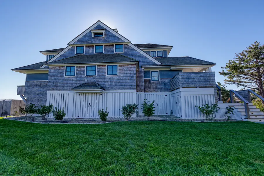 Shingled Great Island home seen from the front lawn