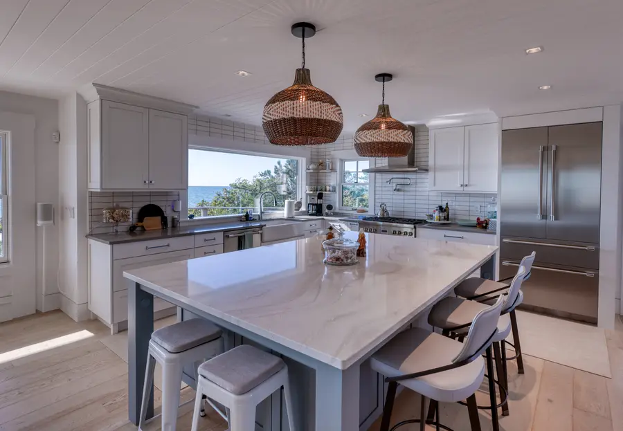 Kitchen island and stainless appliances