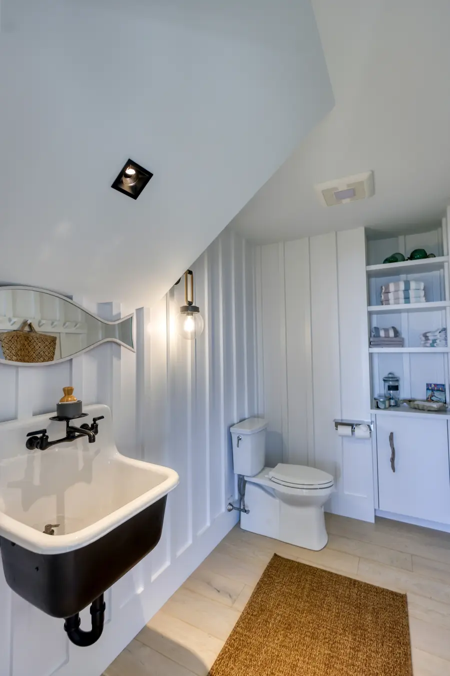 Bathroom with built-in shelving