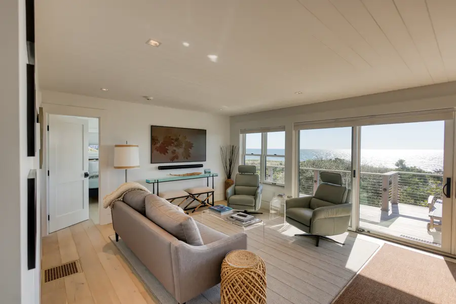 Living room seating toward the windows