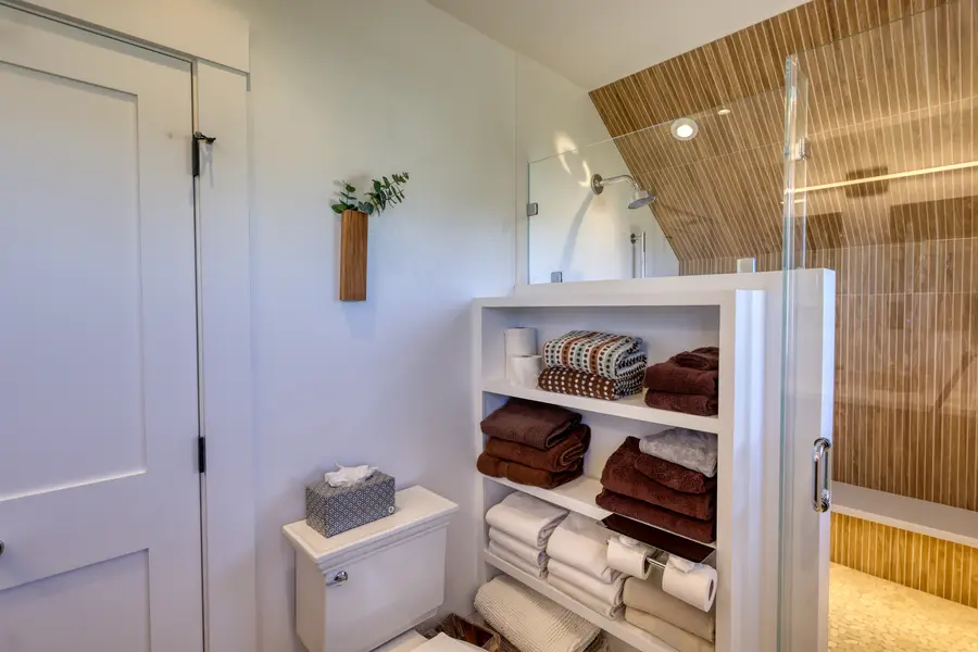 Linen closet with open shelving